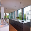Mat zwarte keuken van Next125 met  RVS aanrechtblad - Ekelhoff Keukens Nordhorn