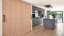 Matgrijze keuken SieMatic SLX imet kookeiland in steengrijze Similaque met keramiek keukenblad van Ekelhoff Keukens, Duitsland