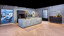 Zicht op een keuken met betonlook eiland en donkere hoge kasten in onze showroom van next125