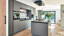 Matgrijze keuken SieMatic SLX imet kookeiland in steengrijze Similaque van Ekelhoff Keukens in Duitsland