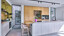 Maatwerk keuken in balkeneiken met ballerina keukenwiland en coffeecorner. Het aanrechtblad is vanDekton keramiek. Ekelhoff Keukens, net over de grens in Nordhorn