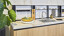 next125 keuken in Japandi stijl met ribbelfronten en next125 Frame systeem voor achterwand of nis. Ekelhoff Keukens Nordhorn.